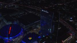 HD stock footage aerial video of flying away from Ritz-Carlton Hotel at night, Downtown Los Angeles, California Aerial Stock Footage | CAP_018_196