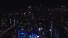 HD stock footage aerial video of the Downtown Los Angeles skyline at night, California Aerial Stock Footage | CAP_018_199