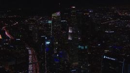 HD stock footage aerial video of approaching Wilshire Grand Center at night, Downtown Los Angeles, California Aerial Stock Footage | CAP_018_200