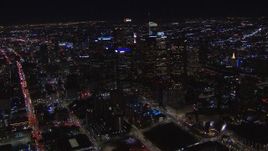 HD stock footage aerial video of a wide orbit of tall skyscrapers at night, Downtown Los Angeles, California Aerial Stock Footage | CAP_018_208