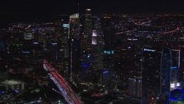 HD stock footage aerial video flyby Wilshire Grand Center and skyline at night, Downtown Los Angeles, California Aerial Stock Footage | CAP_018_217