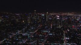 HD stock footage aerial video zooming to wider view of city's skyline at night, Downtown Los Angeles, California Aerial Stock Footage | CAP_018_220