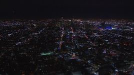 HD stock footage aerial video of the distant downtown skyline at night, Downtown Los Angeles, California Aerial Stock Footage | CAP_018_222