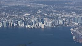HD stock footage aerial video of flying by the city's downtown skyline, Downtown Miami, Florida Aerial Stock Footage | CAP_020_007