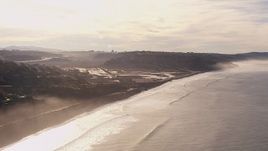 HD stock footage aerial video of flying away from coastal cliffs, lagoon, and hillside homes in Torrey Pines and Del Mar, California Aerial Stock Footage | CAP_021_006