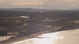 HD stock footage aerial video of a reverse view of the power plant and smoke stack in Carlsbad, California Aerial Stock Footage | CAP_021_019