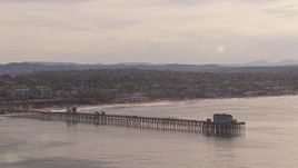 HD stock footage aerial video of flying away from Oceanside Pier with view of the community of Oceanside, California Aerial Stock Footage | CAP_021_025
