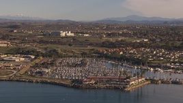 HD stock footage aerial video of a marina and oceanfront hotel in Oceanside, California Aerial Stock Footage | CAP_021_026