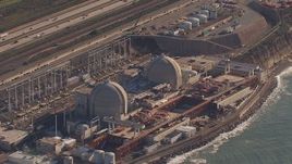 HD stock footage aerial video of a reverse view of the San Onofre Nuclear Power Plant, California Aerial Stock Footage | CAP_021_050