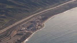 HD stock footage aerial video of flying away from the San Onofre Nuclear Power Plant on the coast, California Aerial Stock Footage | CAP_021_052