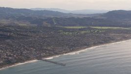 HD stock footage aerial video of a wide view of a pier by coastal neighborhoods in San Clemente, California Aerial Stock Footage | CAP_021_058
