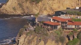 HD stock footage aerial video of orbiting clifftop mansions overlooking the ocean, Laguna Beach, California Aerial Stock Footage | CAP_021_072
