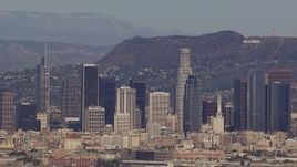 HD stock footage aerial video of the city's skyline and Hollywood Sign, Downtown Los Angeles, California Aerial Stock Footage | CAP_021_086