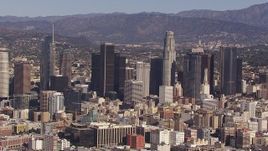 HD stock footage aerial video of passing by skyscrapers in the city's skyline, Downtown Los Angeles, California Aerial Stock Footage | CAP_021_093