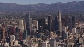 HD stock footage aerial video of flying by tall skyscrapers in the city's skyline, Downtown Los Angeles, California Aerial Stock Footage | CAP_021_095