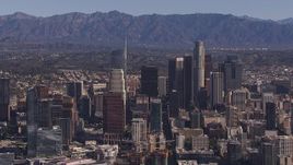 HD stock footage aerial video of passing by tall skyscrapers in the city's skyline, Downtown Los Angeles, California Aerial Stock Footage | CAP_021_096