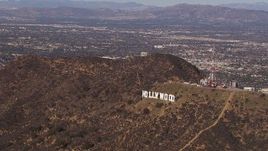 HD stock footage aerial video of slowly flying toward the famous Hollywood Sign, Los Angeles, California Aerial Stock Footage | CAP_021_117