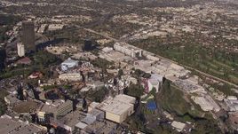 HD stock footage aerial video tilt to and orbit Universal Studios Hollywood, Universal City, California Aerial Stock Footage | CAP_021_122