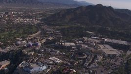 HD stock footage aerial video of orbiting Universal Studios Hollywood theme park, Universal City, California Aerial Stock Footage | CAP_021_124
