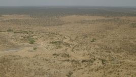 HD stock footage aerial video of passing open savanna, Zimbabwe Aerial Stock Footage | CAP_026_027