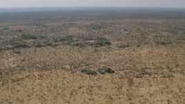 HD stock footage aerial video of a wide expanse of savanna, Zimbabwe Aerial Stock Footage | CAP_026_036