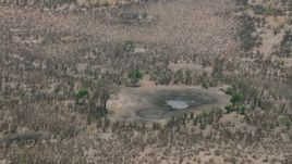 HD stock footage aerial video of orbiting a nearly dry pond in the savanna, Zimbabwe Aerial Stock Footage | CAP_026_039