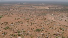 HD stock footage aerial video of flying over a small village, Botswana Aerial Stock Footage | CAP_026_090