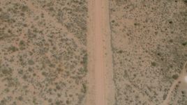 HD stock footage aerial video of a bird's eye view of a dirt road, Zimbabwe Aerial Stock Footage | CAP_026_117