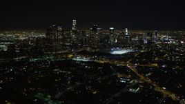 5K aerial stock footage pan right revealing downtown Los Angeles skyline at night, California Aerial Stock Footage | DCA01_011