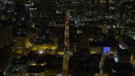 5K aerial stock footage tilt up to reveal Downtown Los Angeles skyscrapers at night, California Aerial Stock Footage | DCA01_016