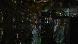 5K aerial stock footage bird's eye view of South Hope Street in Downtown Los Angeles at night, California Aerial Stock Footage | DCA01_043