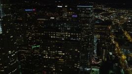 5K aerial stock footage flying by and orbiting skyscrapers in Downtown Los Angeles at night, California Aerial Stock Footage | DCA01_053E