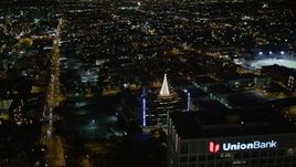 5K aerial stock footage flying by Downtown Los Angeles office towers at night, California Aerial Stock Footage | DCA01_058E