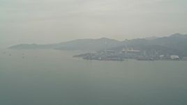 4K aerial stock footage of Castle Peak Power Station seen from the South China Sea, New Territories, Hong Kong, China Aerial Stock Footage | DCA02_053