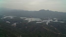 4K aerial stock footage approach Tai Lam Chung Reservoir in New Territories, Hong Kong, China Aerial Stock Footage | DCA02_064