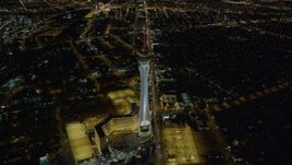 4K aerial stock footage video of approaching Stratosphere, Las Vegas, Nevada Night Aerial Stock Footage | DCA03_003