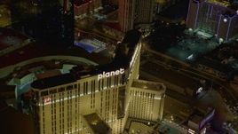 4K aerial stock footage of orbiting Planet Hollywood and street with traffic, Las Vegas, Nevada Night Aerial Stock Footage | DCA03_044