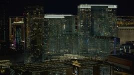 4K aerial stock footage of approaching Aria Resort and Casino, Las Vegas, Nevada Night Aerial Stock Footage | DCA03_049