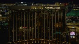 4K aerial stock footage of approaching Mandalay Bay, Las Vegas, Nevada Night Aerial Stock Footage | DCA03_054