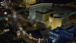 4K aerial stock footage of panning across Imperial Palace, Harrah's, The Venetian, Las Vegas, Nevada Night Aerial Stock Footage | DCA03_063