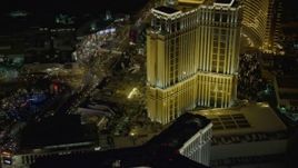 4K aerial stock footage of flying by Palazzo from Las Vegas Boulevard, Las Vegas, Nevada Night Aerial Stock Footage | DCA03_065