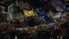 4K aerial stock footage of flying by The Venetian, Harrah's, Imperial Palace, Las Vegas, Nevada Night Aerial Stock Footage | DCA03_069