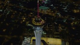 4K aerial stock footage of orbiting top of Stratosphere, Las Vegas, Nevada Night Aerial Stock Footage | DCA03_083