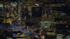 4K aerial stock footage tilt up on Las Vegas Boulevard, revealing hotels on Las Vegas Strip, Nevada Night Aerial Stock Footage | DCA03_123