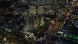 4K aerial stock footage of approaching New York New York Hotel and Casino, Las Vegas, Nevada Night Aerial Stock Footage | DCA03_143