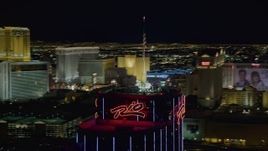 4K aerial stock footage of orbiting the top of Rio Hotel and Casino, Las Vegas, Nevada Night Aerial Stock Footage | DCA03_150