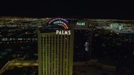4K aerial stock footage of approaching and orbiting Palms Casino Resort, Las Vegas, Nevada Night Aerial Stock Footage | DCA03_152