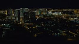 4K aerial stock footage of approaching hotels on Las Vegas Strip, Nevada Night Aerial Stock Footage | DCA03_157