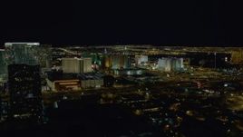 4K aerial stock footage of approaching hotels on Las Vegas Strip, Nevada Night Aerial Stock Footage | DCA03_158