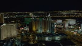 4K aerial stock footage of approaching New York New York Hotel and Casino, Las Vegas, Nevada Night Aerial Stock Footage | DCA03_159